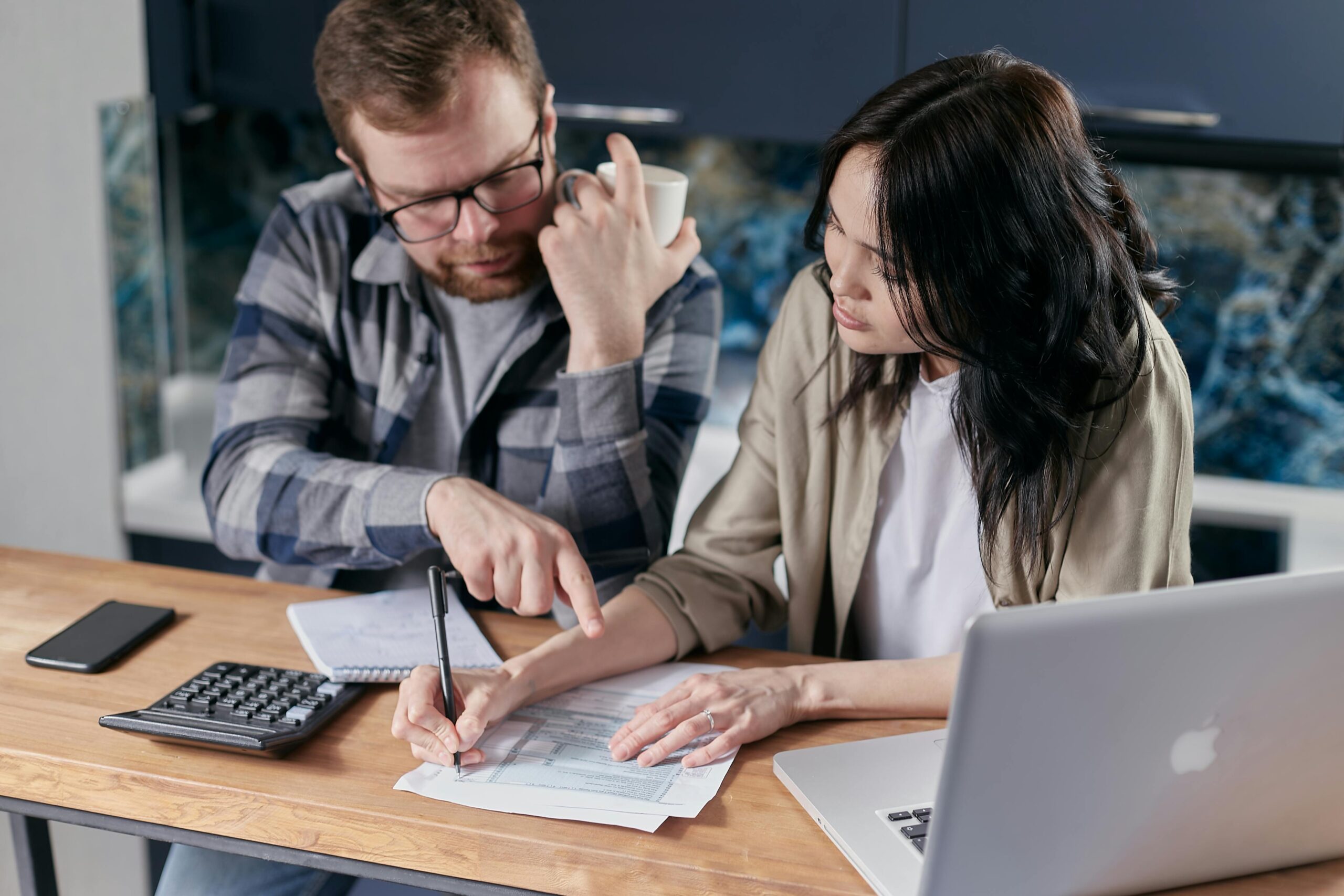 Free couple calculating al their bills stock photo