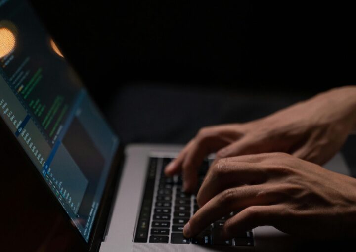 person-using-silver-and-black-laptop-computer
